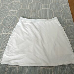 Peter Millar skirt. Built in liner. Never worn. 17.5 inches long